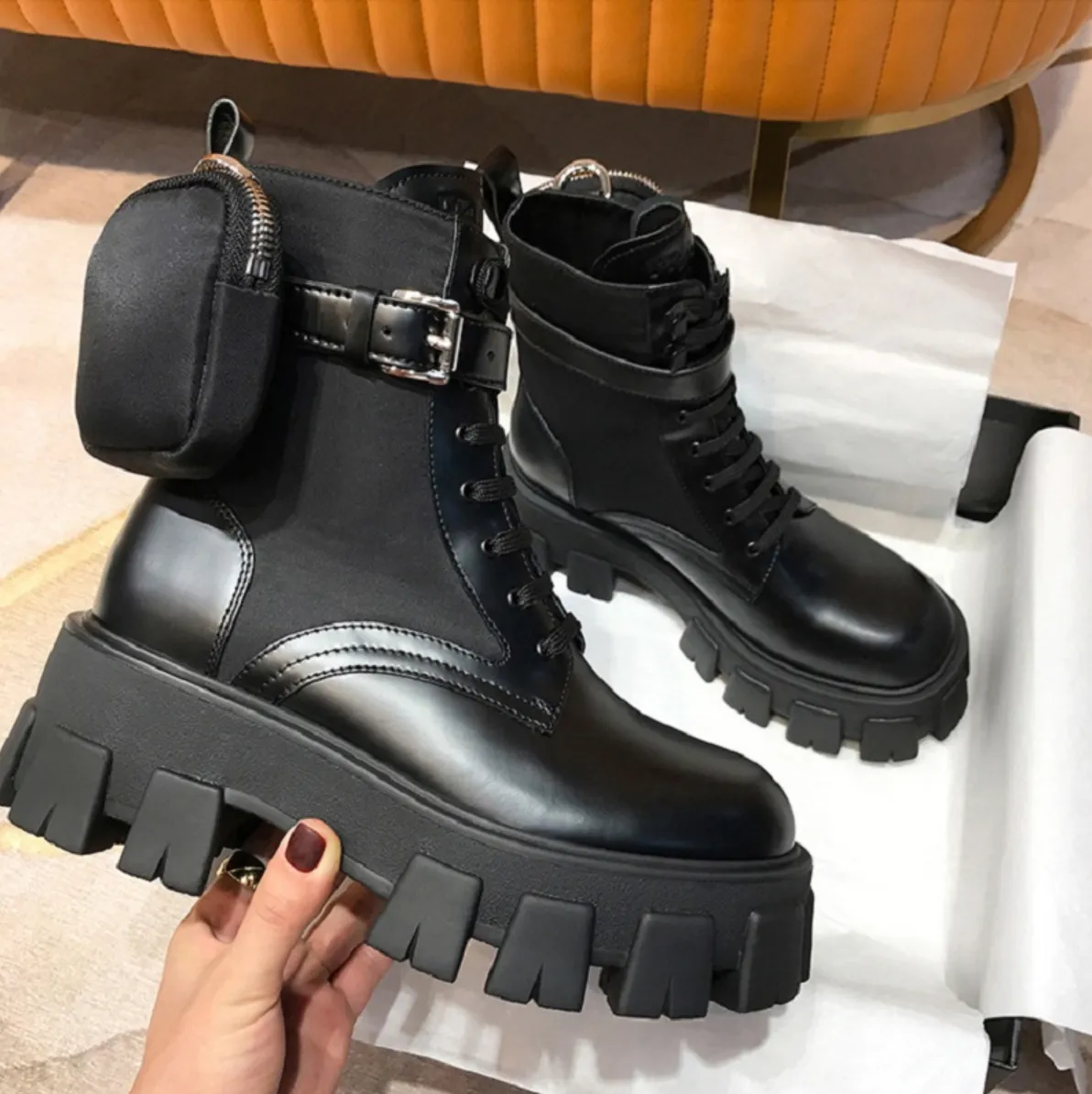 black combat boots with side pockets