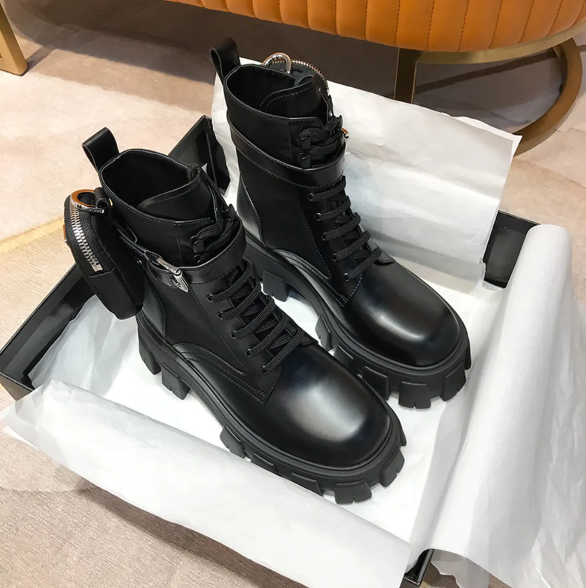 black combat boots with side pockets