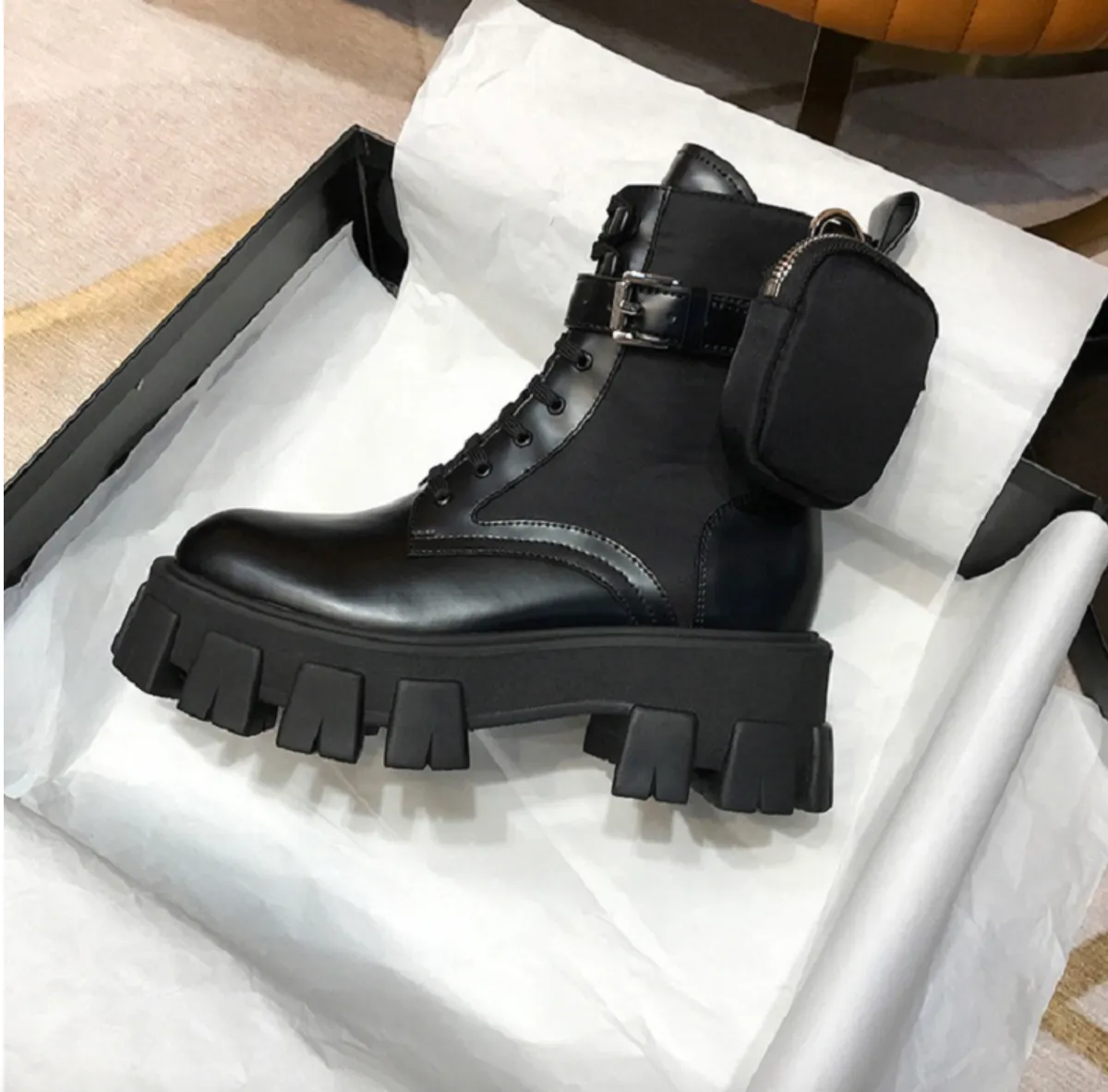 black combat boots with side pockets