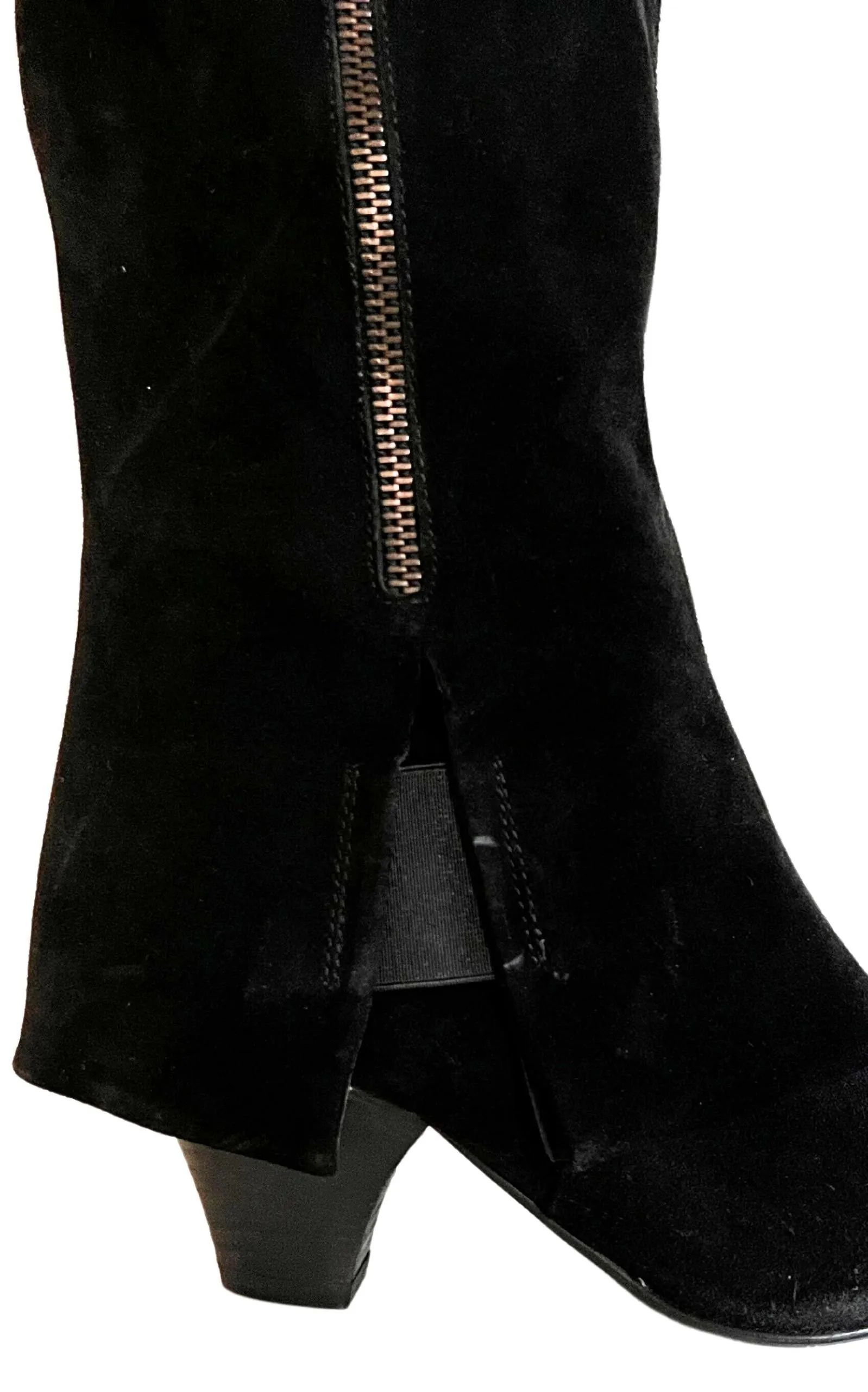 Black suede over-the-knee boots.