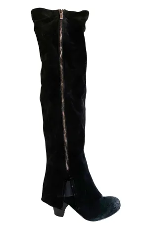 Black suede over-the-knee boots.